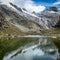 Reflections on a glacial lake in the Cordillera, Blanca. Huaraz, Peru