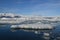 Reflections of glaciers in the frigid waters in a lagoon