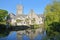 Reflections of Mill Pond cottages and St Mary`s Church in Church Hill, Swanage