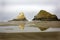 Reflections of the monoliths at Heceta Head State park