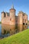 Reflections of Muiderslot Castle, a medieval castle near Amsterdam