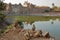 Reflections of Ratan Singh Palace located inside the fort Garh of Chittorgarh, Rajasthan, India. With Monkeys Gray Langur in t