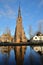 Reflections of the Roman Catholic Saint Lawrence Laurentius church located along herengracht street in Weesp