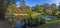 Reflections in a secluded lake in the Botanical gardens at Peradeniya, Kandy, Sri Lanka, Asia