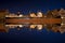 Reflections of the ship Soldek at night in the river Motlawa in