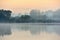 Reflections of sunrise at quiet lake in The Lithuania