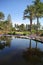 Reflections in the water and beautiful landscape with plants, flowers, trees, gardens, Stavanger, Norway