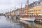 Reflections in the water of sailing vessels in Nyhavn harbor, Cope