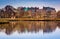 Reflections of waterfront buildings along the Potomac River in A