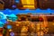 Reflections in a window in downtown Santa Fe showing a very blue sky and Turkish lanterns and adobe architecture