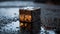 Reflective Serenity: The Illuminated Metallic Cube Amidst Rain-Soaked Asphalt at Night