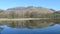 Reflective symmetry in a lake