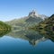 Reflexion of a mountain in a lake in the Pyrenees