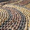 Reflexology cobblestones pathway for foot massage. Pattern from convex pebble stones. Textured surface from boulders