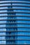 Reflextion on modern blue glass of office windows