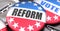 Reform and elections in the USA, pictured as pin-back buttons with American flag colors, words Reform and vote, to symbolize that