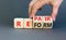 Reform and repair symbol. Concept words Reform Repair on wooden block. Beautiful grey table grey background. Businessman hand.