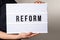 Reform. Text in light box. Medicine, education and economics concept