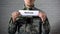 Reform word written on sign in hands of male soldier, military law amendment