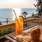 Refresh with Glass of Orange Juice on a Table, with the Vast Sea and Ocean as a Breathtaking Backdrop.AI generated