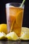 Refresh Ice tea with lemon. Black stone background