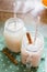 Refreshing Agua de Horchata Mexican Drink with Cinnamon Sticks and Straws