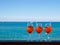 Refreshing aperitif Aperol spritz on a background of blue sea an