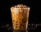 Refreshing bubble tea milkshake in glass with splashing milk, delicious and tasty beverage concept