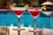 refreshing cosmopolitan cocktails in elegant glasses by poolside