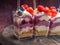 Refreshing dessert: frozen berries sorbet with fresh berries, jam, ice cream