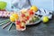 Refreshing drink of citrus  berries  mint leaves and ice on the table