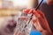 Refreshing drink in the summer: Girl is holding glass with cold beverage