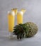Refreshing freshly made fruit juice on a glass , fresh pineapple juice