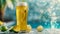 A refreshing glass of beer with condensation, surrounded by limes and salt, against a tropical backdrop