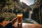 Refreshing glass of juice at picturesque riverside cafe with stunning waterfall view. Generative AI