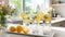 Refreshing lemon and lime infused water in traditional glasses on white kitchen counter