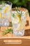 Refreshing lemonade drink with rosemary in glasses