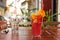 Refreshing lemonade on wooden table