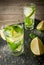 Refreshing lime mojito or tequila with ingredients for it