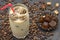 Refreshing milkshake with coffee ice cubes. Coffee beans, coffee ice cubes