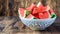 Refreshing Morning Delight: Nourishing Watermelon Bowl Served on a Wooden Platter