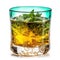 Refreshing Moroccan Mint Tea in a Glass on White Background .