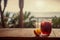 Refreshing Sangria: A Fruity Spanish Punch Served on Rustic Wooden Table with a Scenic Beach, Palm Trees, and Sea View