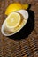 Refreshing Sliced Lemon Outdoors on Wooden Wicker