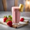 A refreshing strawberry banana smoothie with a strawberry and banana slice1