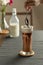 Refreshing summer drinks or beverages, chocolate cocoa latte with chocolate sauce, and cold foam milk on top in a tall glass, on a