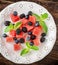 Refreshing summer salad with cubes of watermelon