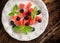 Refreshing summer salad with cubes of watermelon