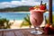 Refreshing Tropical Milkshake Cocktail with Juices, Strawberries, and Ice Enjoyed on a tables. Ocean view in sunny day in