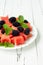 Refreshing watermelon salad with blackberries and mint. Fresh star shaped watermelon.